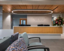 Cancer center waiting area with reception desk