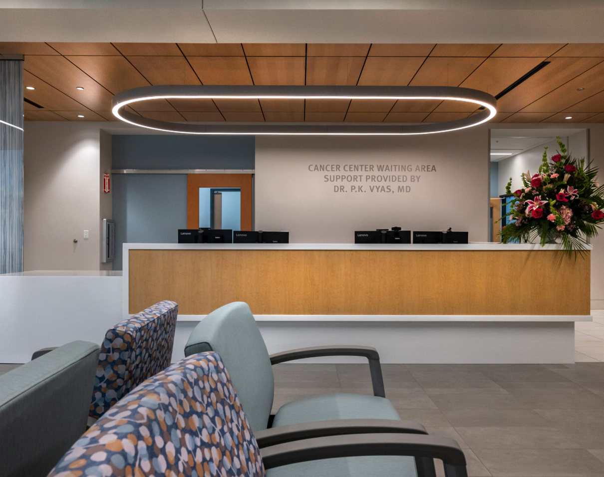 Cancer center waiting area with reception desk