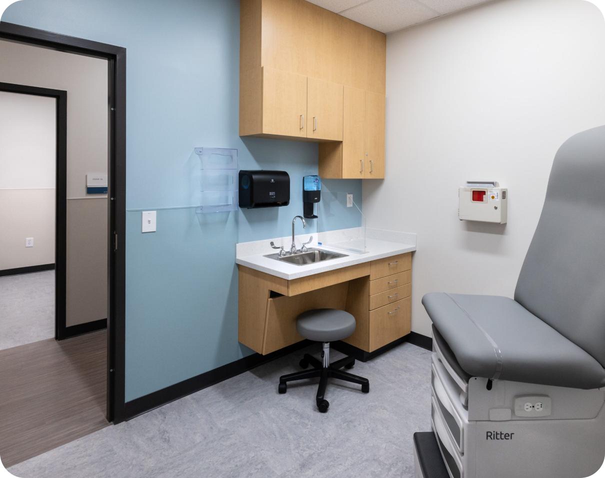 Medical exam room with sink and exam table